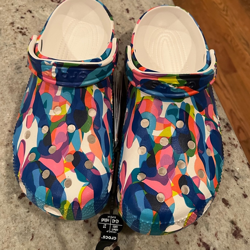 Never worn/tags on, multi colored crocs-LIMITED ADDITION. Men’s size 8.